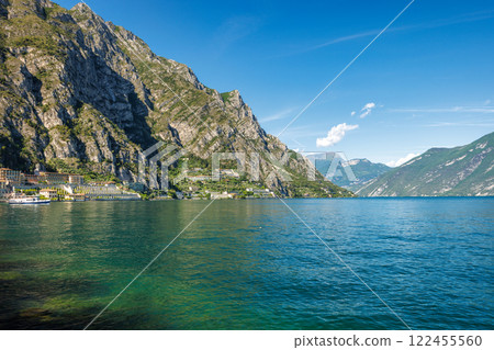 Lake Garda with mountains in background, view from Limone Sul Garda town, Italy, Europe. Lake Garda with mountains in background, view from Limone Sul Garda town, Italy, Europe. 122455560