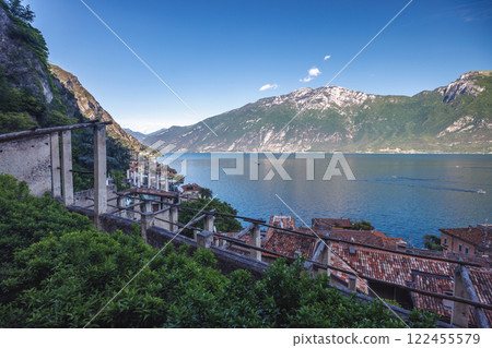 Lake Garda with mountains in background, view from Limone Sul Garda town, Italy, Europe. 122455579