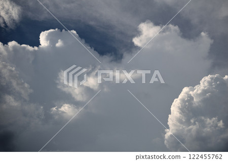 Developing cumulonimbus clouds on a midsummer afternoon. 122455762