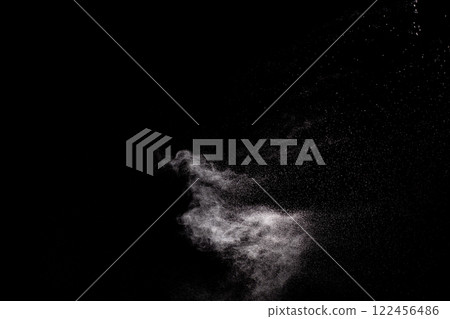 Black and white photo of a cloud of white powder 122456486