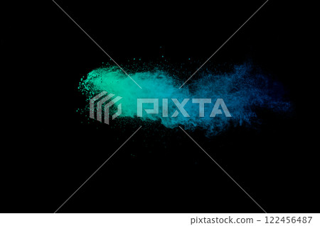 Blue and green explosion of powdery dust 122456487