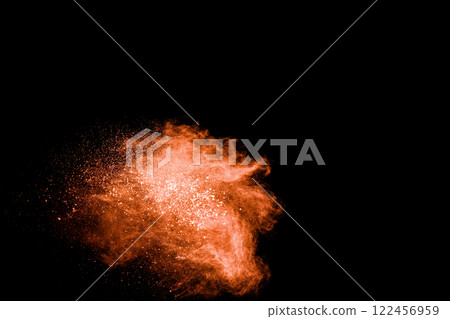 Bright orange cloud of smoke is rising from the ground 122456959