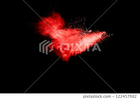 Red cloud of powdery dust is floating in the air Red cloud of powdery dust is floating in the air 122457082