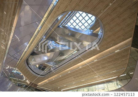 Jan 10 2025 Modern HK Shopping Mall Interior with Glass Balustrades Jan 10 2025 Modern HK Shopping Mall Interior with Glass Balustrades 122457113