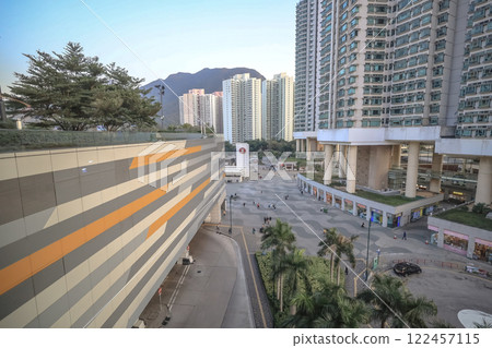 Jan 10 2025 Urban Residential Buildings with Mountain Backdrop at Tung Chung Jan 10 2025 Urban Residential Buildings with Mountain Backdrop at Tung Chung 122457115