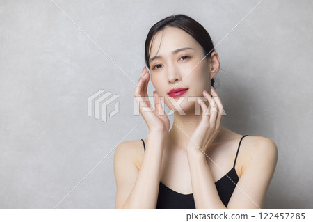 A young lady hitting his cheek A young lady hitting his cheek 122457285