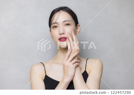 A young lady hitting his cheek A young lady hitting his cheek 122457290