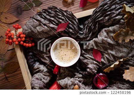 Halloween festive autumn background. Autumn decor from pumpkins, berries, maple leaves and chestnuts on old rustic white wooden backgrounds. Concept of Thanksgiving day Halloween. Top view copy space Halloween festive autumn background. Autumn decor from pumpkins, berries, maple leaves and chestnuts on old rustic white wooden backgrounds. Concept of Thanksgiving day Halloween. Top view copy space 122458196