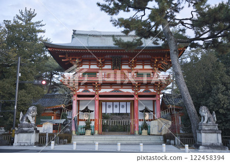 Imamiya Shrine Tower Gate illuminated by the morning sun as seen from Imamiyamonzen-dori Street 6 Imamiya Shrine Tower Gate illuminated by the morning sun as seen from Imamiyamonzen-dori Street 6 122458394