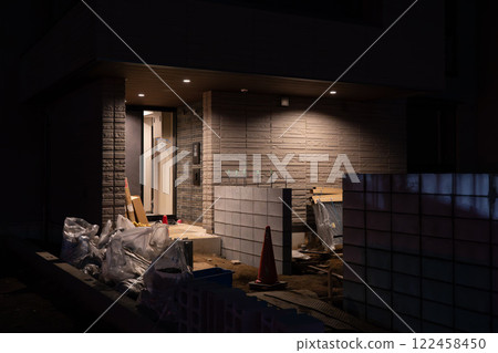 Apartment construction work at night, up from the left Apartment construction work at night, up from the left 122458450