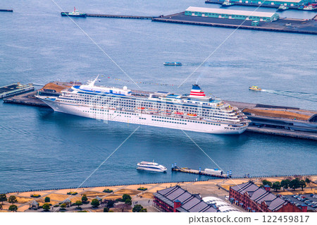 Yokohama cityscape in Japan, with the Asuka II and water buses docked at Osanbashi Pier (January 19, 2025) 122459817