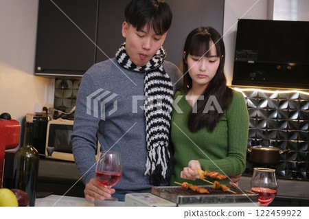Young Asian couple living at home Young Asian couple living at home 122459922