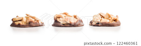 Photography of chocolate Florentines cookies with almonds and chocolate isolated on white background. Photography of chocolate Florentines cookies with almonds and chocolate isolated on white background. 122460361