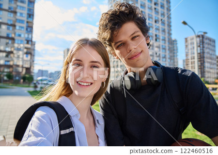 Selfie portrait of happy friends guy and girl college students looking at camera Selfie portrait of happy friends guy and girl college students looking at camera 122460516