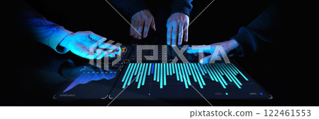 Multiple hands interacting with digital business dashboard featuring real-time analytics, data visualization, and futuristic glowing interface against dark background. Multiple hands interacting with digital business dashboard featuring real-time analytics, data visualization, and futuristic glowing interface against dark background. 122461553