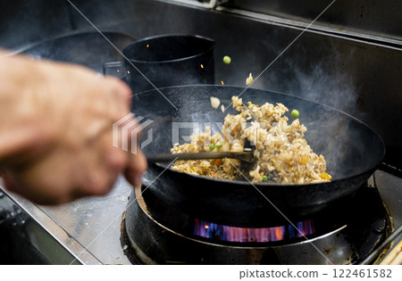 Making fried rice Making fried rice 122461582