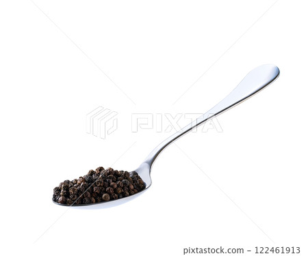 black peppercorns in a metal spoon isolated on white background. 122461913