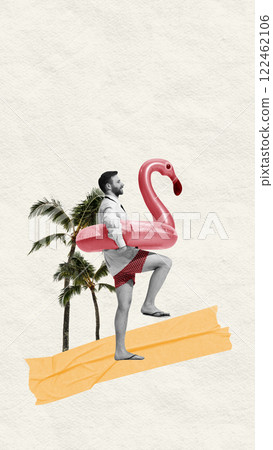 Fun break between meetings. Businessman in suit with flamingo swim ring, walking on sand, tropical palm background. 122462106