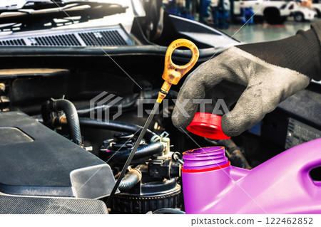 Engine oil change , Checking engine oil level in vehicle maintenance Engine oil change , Checking engine oil level in vehicle maintenance 122462852