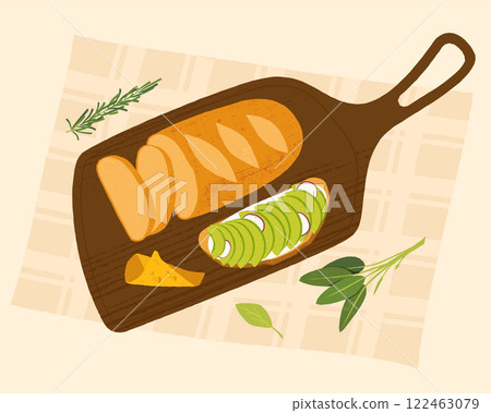 Healthy food concept with sliced bread, cheese and avocado toast lying on a cutting board, with rosemary and sage leaves, on a checkered tablecloth 122463079