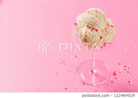 A charming ice cream treat adorned with heart-shaped decor 122464029