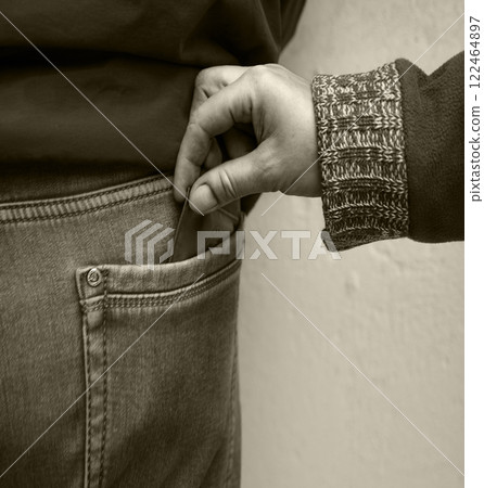 Hand takes a mans money 122464897