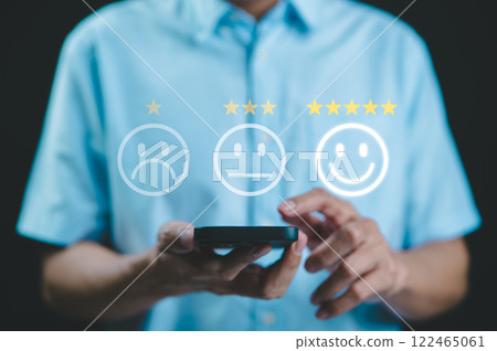 Customer review satisfaction feedback survey concept. Five-star rating on virtual feedback interface, excellent customer satisfaction. emoticons different levels of feedback, customer experience, 122465061