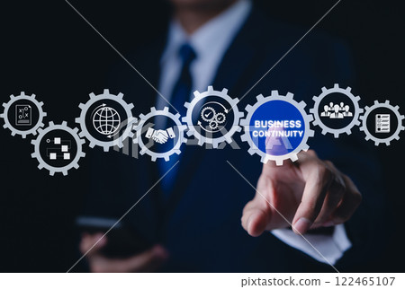 Business continuity concept. Businessman interact with gear featuring business continuity icons. strategies for maintaining operations during disruptions. minimizing financial losses, Risk management, Business continuity concept. Businessman interact with gear featuring business continuity icons. strategies for maintaining operations during disruptions. minimizing financial losses, Risk management, 122465107
