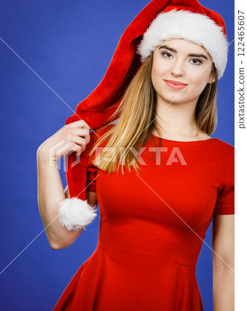 Happy woman wearing Santa Claus helper costume Happy woman wearing Santa Claus helper costume 122465607