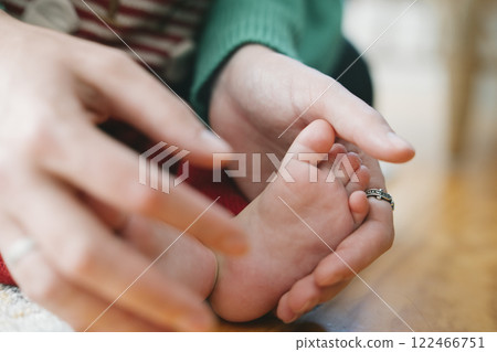Tender Connection The Cherished Interaction Between Parent and Babys Feet Together 122466751