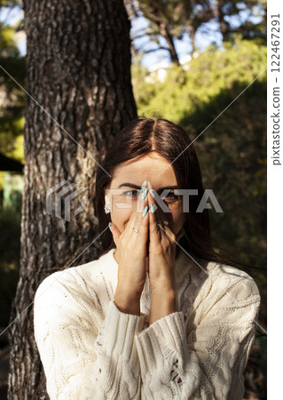 young pretty brunette woman on sea coast, lifestyle people concept young pretty brunette woman on sea coast, lifestyle people concept 122467291