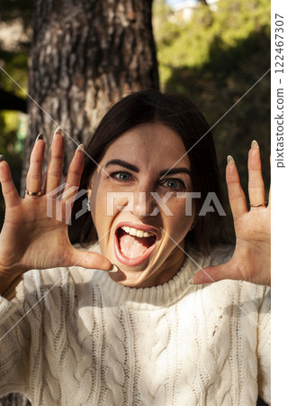 young pretty brunette woman on sea coast, lifestyle people concept 122467307