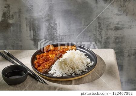 fried chicken in garlic sauce with rice fried chicken in garlic sauce with rice 122467892