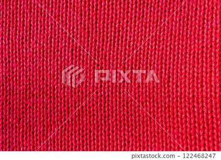 Top view of texture of red knitted fabric as background. Copy sapce 122468247