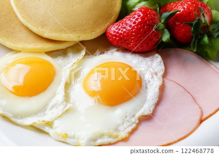 Breakfast ham eggs and pancakes 122468778