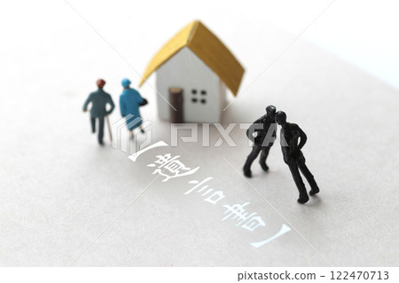 A photo showing inheritance troubles using miniature dolls, a house, and text A photo showing inheritance troubles using miniature dolls, a house, and text 122470713
