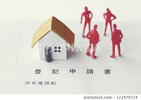 A photo showing inheritance troubles using miniature dolls, a house, and text A photo showing inheritance troubles using miniature dolls, a house, and text 122470724