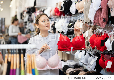 Adult woman choosing bra in store 122470972
