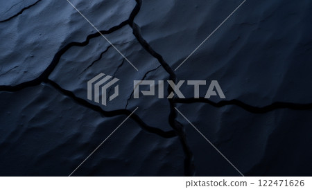 Detailed close-up of a dark, textured rock surface Detailed close-up of a dark, textured rock surface 122471626