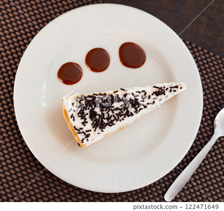 Tasrty slice of banoffee pie topped with whipped cream and chocolate sprinkles, perfect for dessert Tasrty slice of banoffee pie topped with whipped cream and chocolate sprinkles, perfect for dessert 122471649