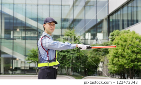 Traffic controller directing traffic Traffic controller directing traffic 122472348