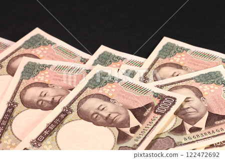 10,000 yen bill on a black background 122472692