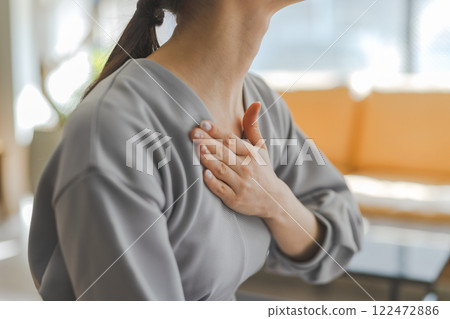 Painful woman pose 122472886