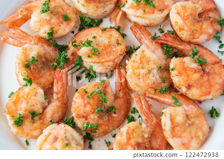 Garlic shrimp on a white plate 122472938