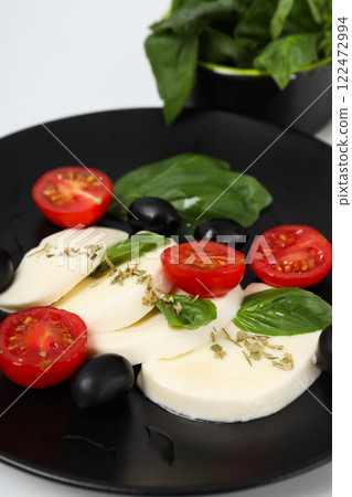 Salad Caprese, concept of tasty and delicious food Salad Caprese, concept of tasty and delicious food 122472994