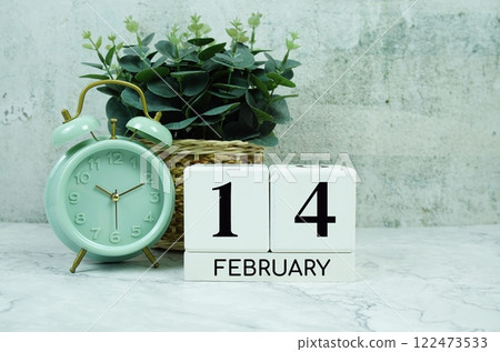 Wooden Calendar Showing the Date of February 14th. Day 14 of February month Wooden Calendar Showing the Date of February 14th. Day 14 of February month 122473533