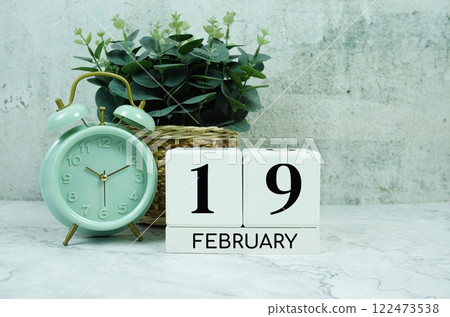 Wooden Calendar Showing the Date of February 19th. Day 19 of February month Wooden Calendar Showing the Date of February 19th. Day 19 of February month 122473538