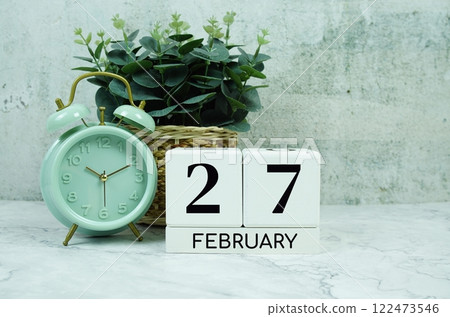 Wooden Calendar Showing the Date of February 27th. Day 27 of February month 122473546