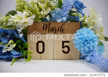 Wooden Calendar Showing the Date of March 5th. Day 5 of March month 122473772