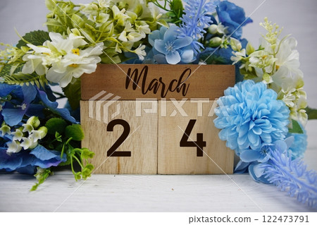 Wooden Calendar Showing the Date of March 24th. Day 24 of March month 122473791